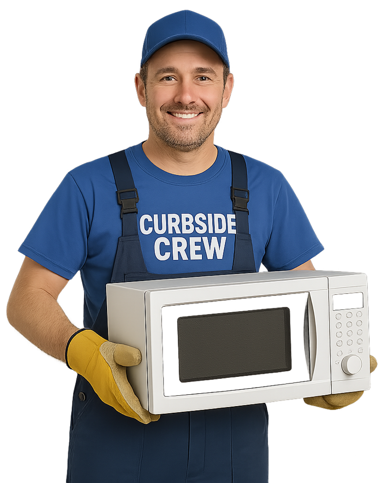 Curbside Junk Removal man holding a microwave